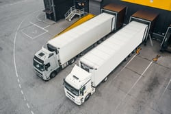 trucks-in-the-distribution-hub-2021-10-22-06-35-08-utc-min