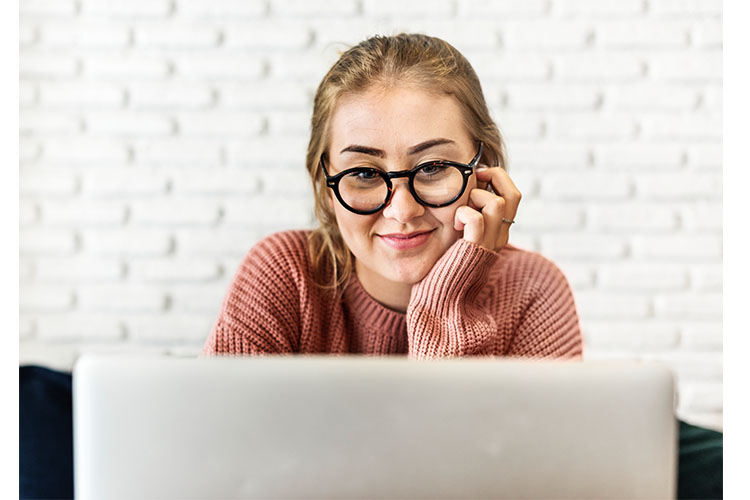 _0002_cheerful-young-woman-using-laptop-2022-12-15-23-04-16-utc