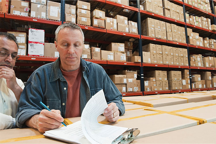 _0002_a-male-causcasian-warehouse-worker-and-an-hispanic-2022-03-04-02-16-54-utc