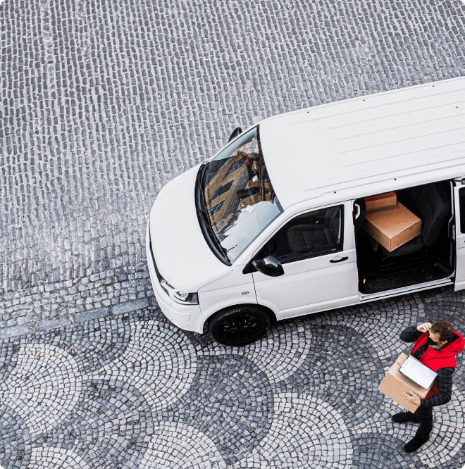 aerial-view-of-delivery-man-courier-with-face-mask-2021-08-27-23-30-09-utc (1) 1-min